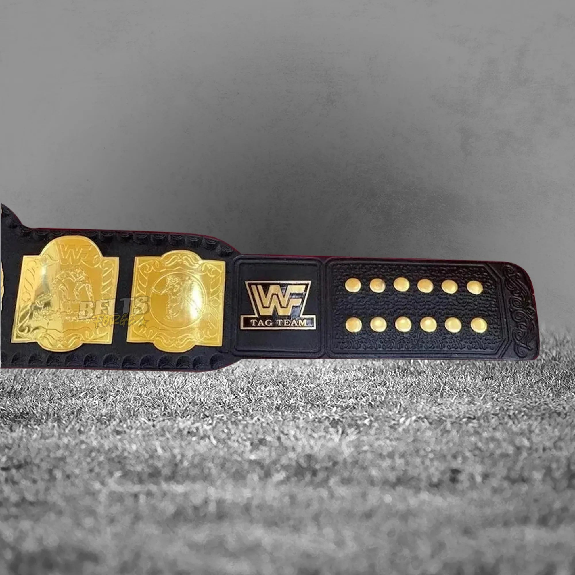 Golden Era Tag Team Championship Belt side strap detail showing gold-plated brass side plate and genuine leather strap close-up
