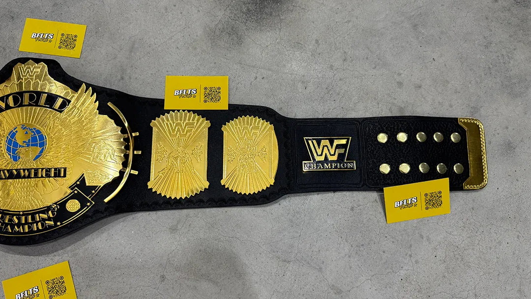 WWF Winged Eagle Championship Belt right strap detail showing WWF Champion side plate and brass leather hardware