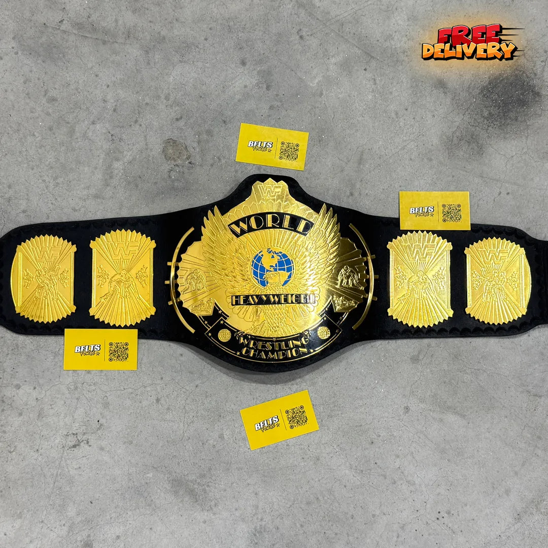 WWF Winged Eagle Championship Belt replica hero shot, gold-plated brass eagle plates and black genuine leather strap by Belts Forge