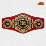 Custom boxing belt with gold crown and world flag plates, red gem accents and a red strap